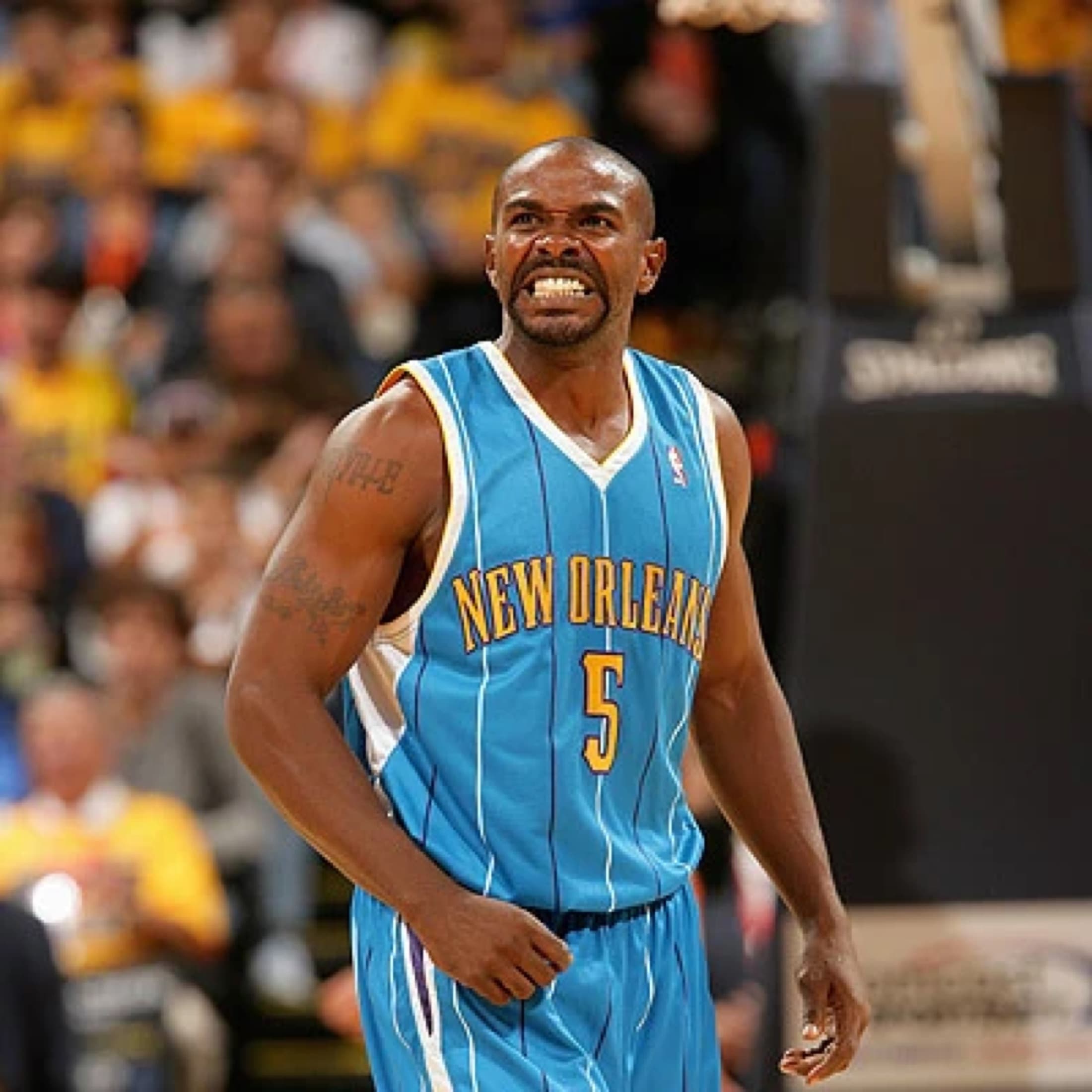 Mike James in a New Orleans Hornets jersey during an NBA game.